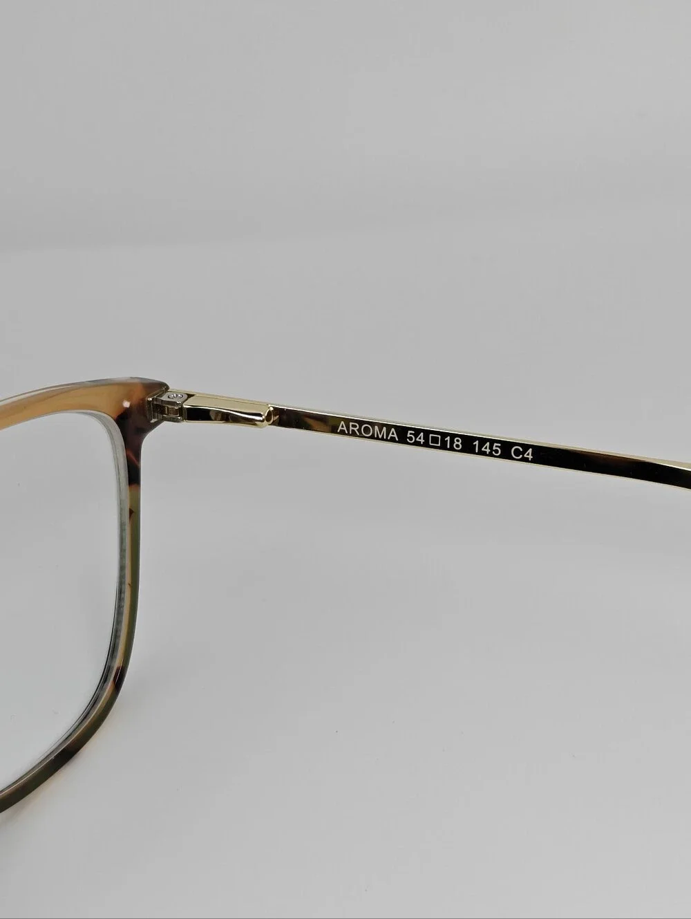 Aroma. Tortoiseshell Full-Rim Women's Eyeglasses. 1/2 Olive Front.